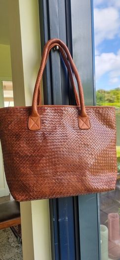 brown leather woven shoulder bag
