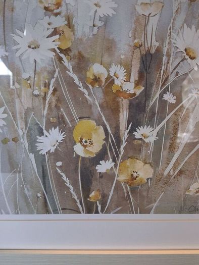 Set of floral pictures in frames