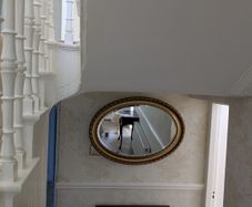 Ornate oval mirror