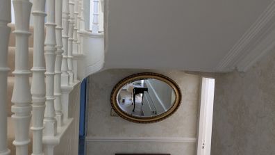 Ornate oval mirror