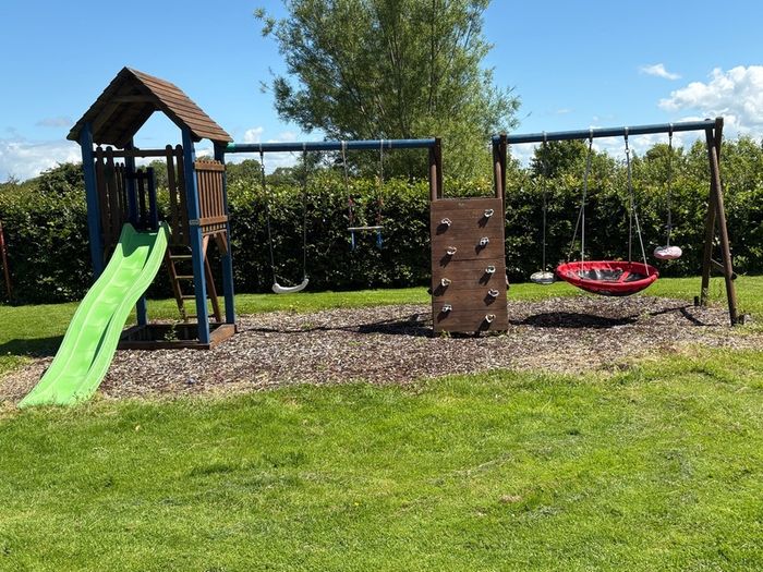 Swing slide climbing wall