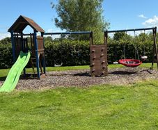 Swing slide climbing wall
