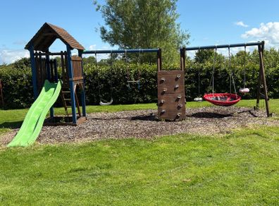 Swing slide climbing wall