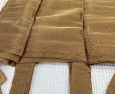 A Pair of Tab Top Voile Curtains. ( Gold) 110 x 230 cm New.