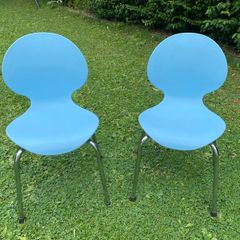 A pair of blue children's chairs