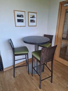 Higjh bar table with three chairs