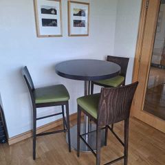 Higjh bar table with three chairs
