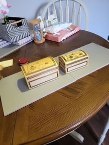 Two straw trinket boxes