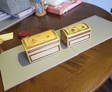 Two straw trinket boxes