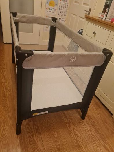 Full size Travel cot with mattress and bedding