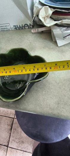 3 different items. No. 1- Mid-Century Porcelain Teapots, Japan, 1960.  95.00 euro. 2- VTG Hand Painted Le Poet Laval France Serving Plate 22.00 euro. 3- Vintage Short Dark Forest Green Ceramic 22.00 euro.