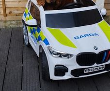 Ride on  Garda car
