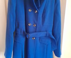 M & S Ladies Coat. Lovely deep blue coat.  It has weight to it.