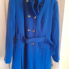 M & S Ladies Coat. Lovely deep blue coat.  It has weight to it.