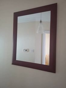 Mirror with wood surround
