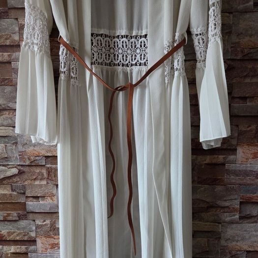 White crochet and pleated beach cover-up dress with a brown belt. Size 10