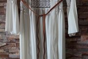 White crochet and pleated beach cover-up dress with a brown belt. Size 10