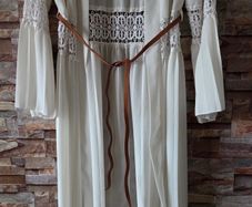 White crochet and pleated beach cover-up dress with a brown belt. Size 10