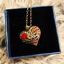 Heart-Shaped Pendant Necklace with Red Glass Heart and Wing Details Image 5