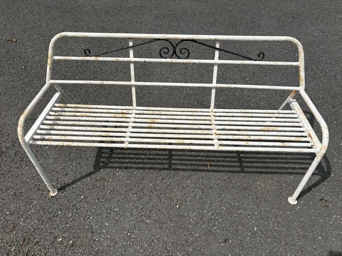 A matching pair of vintage tubalar steel garden benchs c1950
