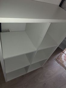 Set of white storage shelves