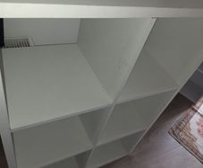 Set of white storage shelves