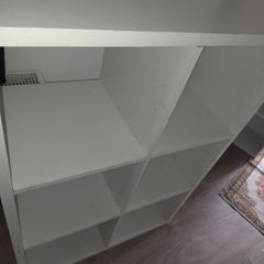 Set of white storage shelves