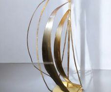 Brass sailing boat on crystal stand