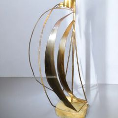 Brass sailing boat on crystal stand