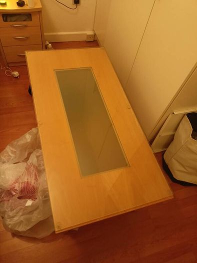 Glass topped coffee table