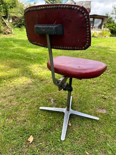 Vintage red swivel and tilt office chair