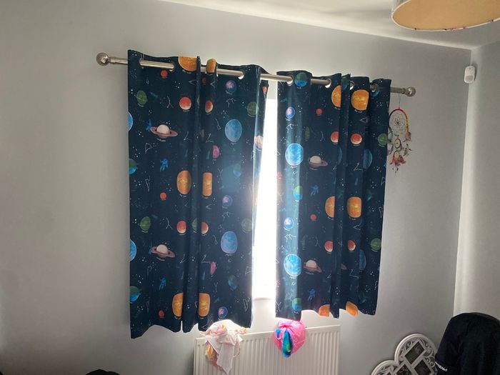 Two blackout curtains and two curtain poles