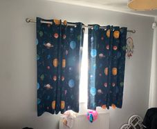 Two blackout curtains and two curtain poles