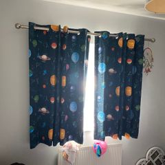 Two blackout curtains and two curtain poles