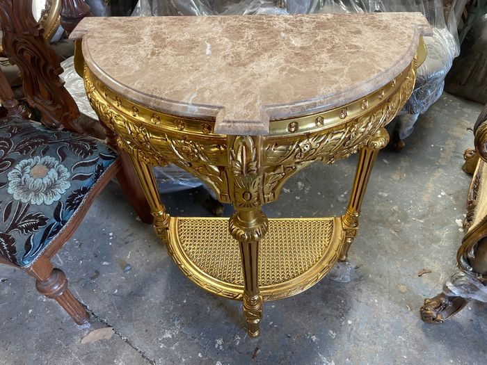 Carved wood gilt console table