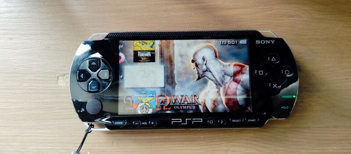 Psp 1000 Modded 64gb 40 psp original charger Excellent condition