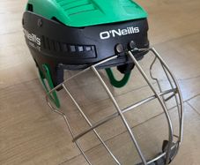 Hurling helmet and a hurley (size S)