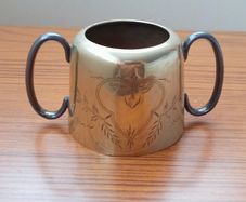 Two handled silver-plated sugar bowl made in Sheffield
