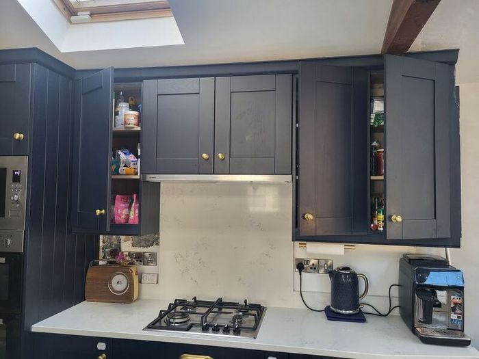 Kitchen units, island and quartz worktops.