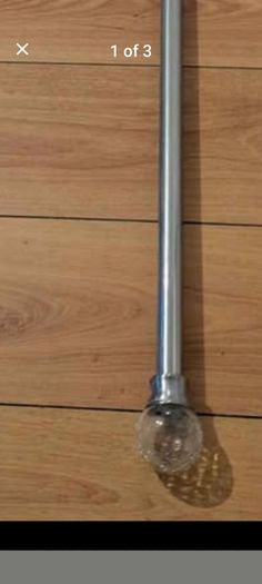 curtain pole, chrome and glass