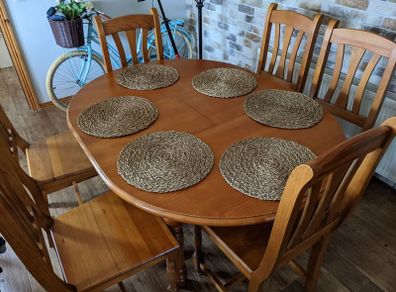 Oak dining table with 6 chairs.