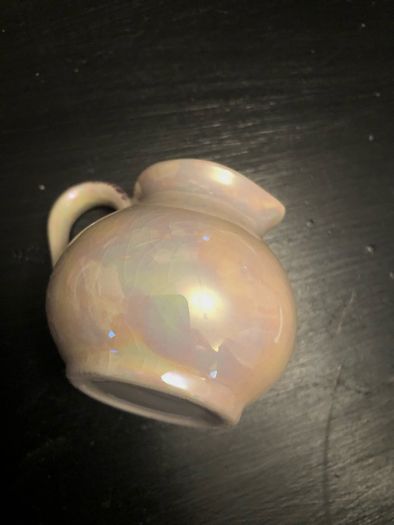 Old glazed creamer jug