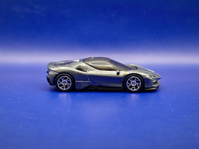 Hot Wheels Ferrari SF90 Stradale with custom wheels.