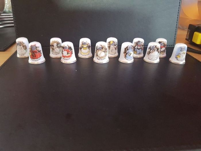 Collection of Thimbles Animals doing Household Chores