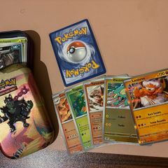 Pokemon TCG Bulk with 5 Rare Holo/Reverse Holo + 1 EX Card and including Tin!