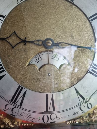 A Georgian grandfather clock made by the English clockmaker John Rogers of Leominster