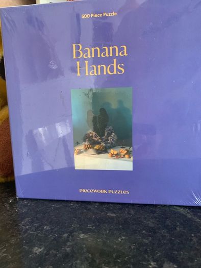 Piecework Puzzles Banana Hands