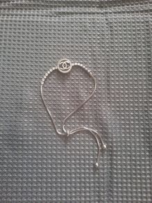 pretty silver colour cc bracelet