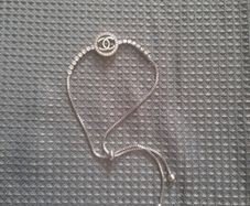 pretty silver colour cc bracelet