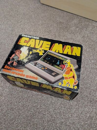 Grandstand Cave man handheld for repair